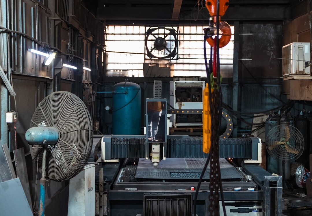 Modern robot arm in industrial setting